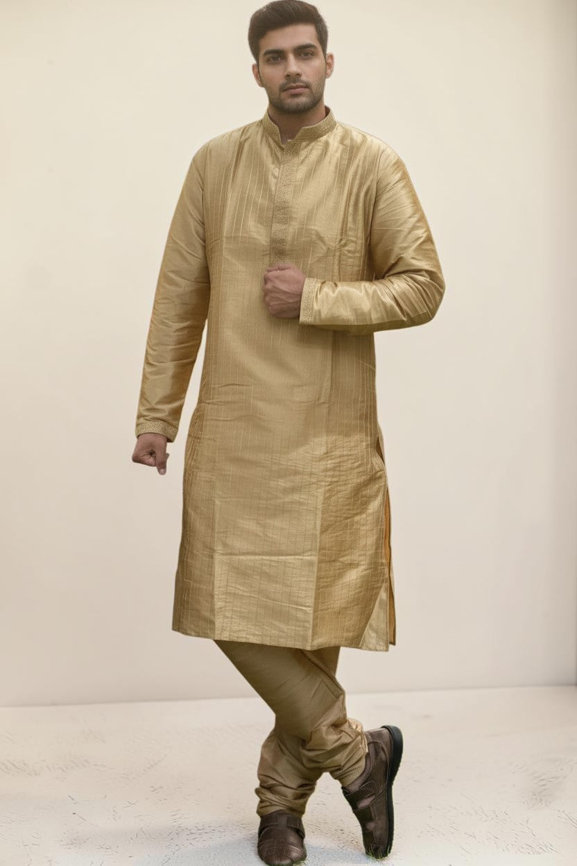 Panache By Divya gold silk kurta pajama set with subtle vertical stripe pattern and embroidered neckline.