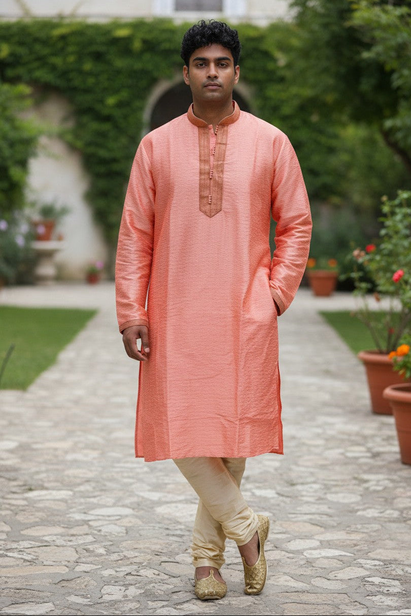 Panache By Divya peach textured kurta pajama set with gold embroidered collar and cuffs.
